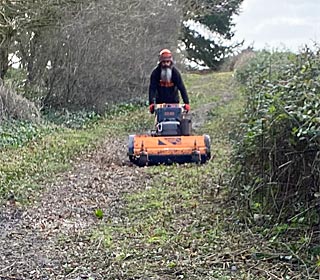 clearing footpaths with mower